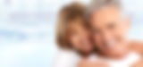 older couple hugging and smiling showing the benefits of dental care from trusted Costa Mesa dentist near me Dr. Michael Spitzer