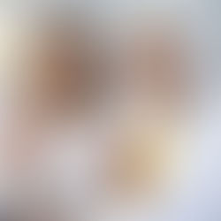 Woman discussing hearing aid care with doctor.