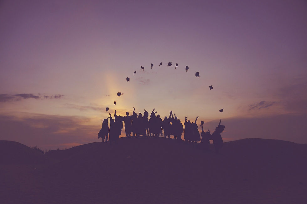 graduates tossing cap.jpg