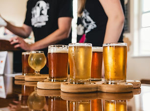 Taproom Host welcoming guests at Fetch’s self-serve taproom and creating a friendly customer experience.