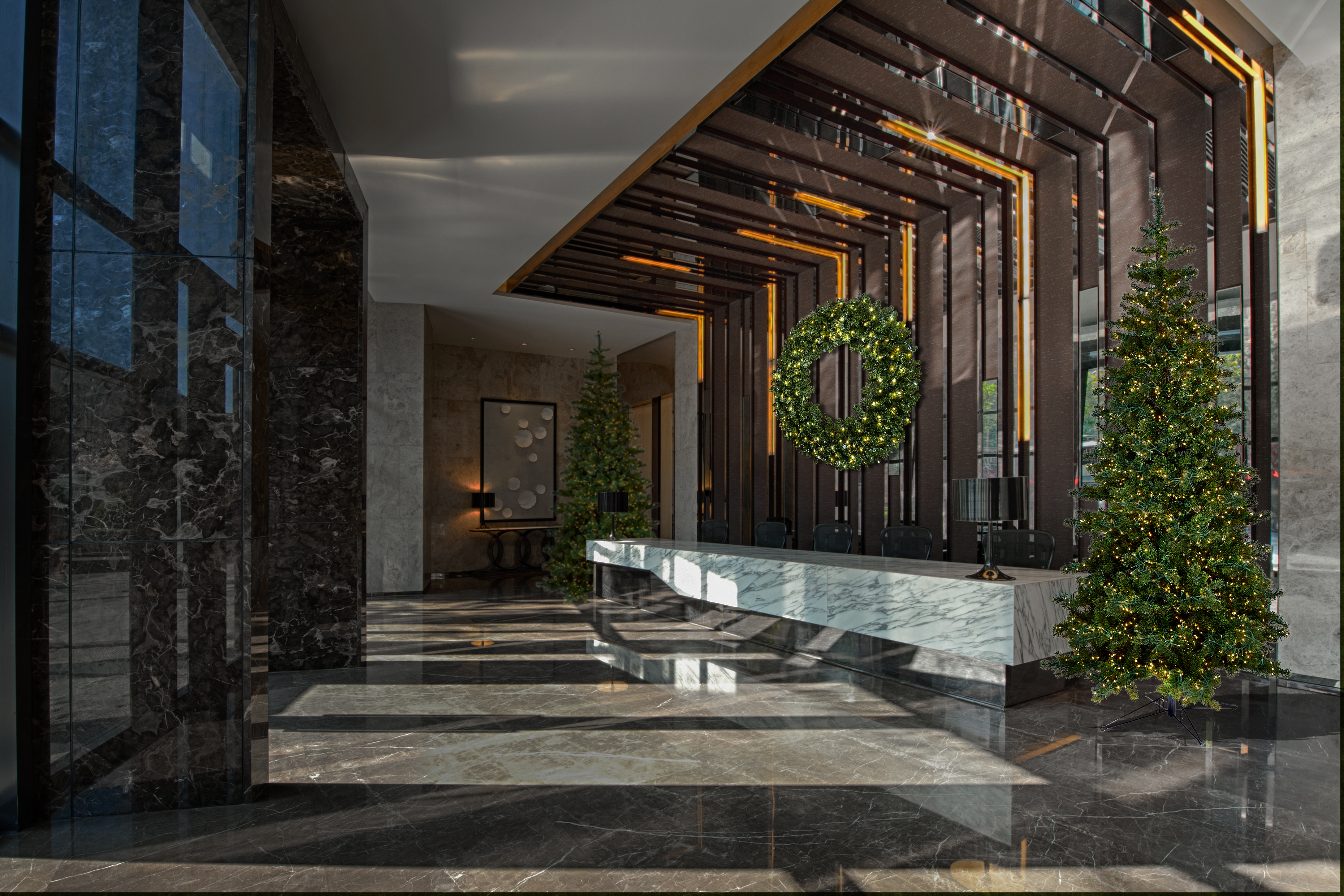 Modern lobby with wreaths and greenery