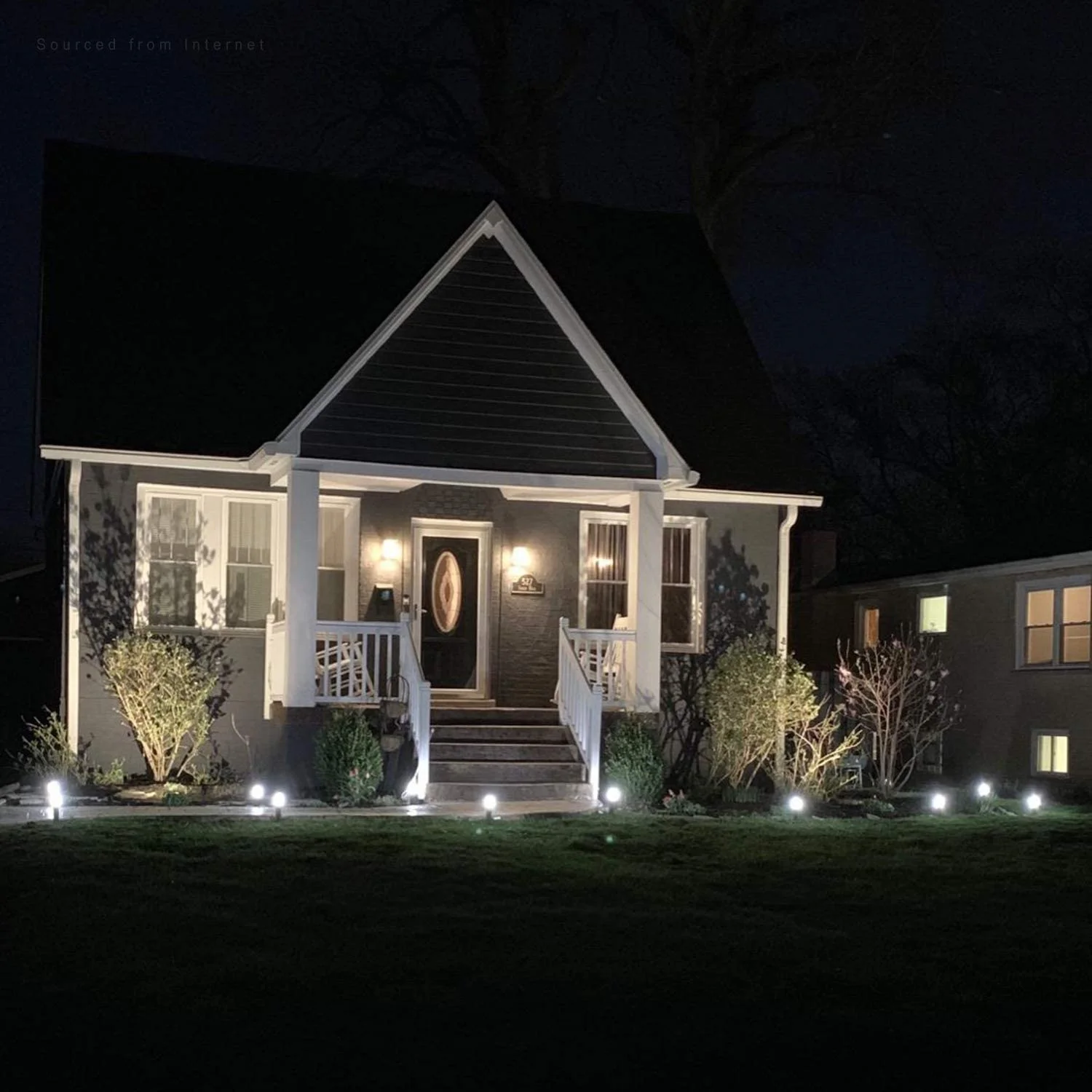 Cottage entry with path and step lighting