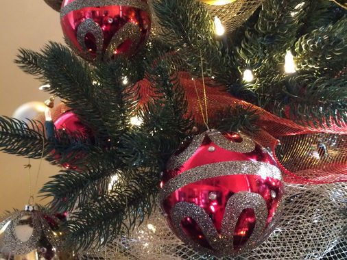 Christmas tree with red and gold ornaments