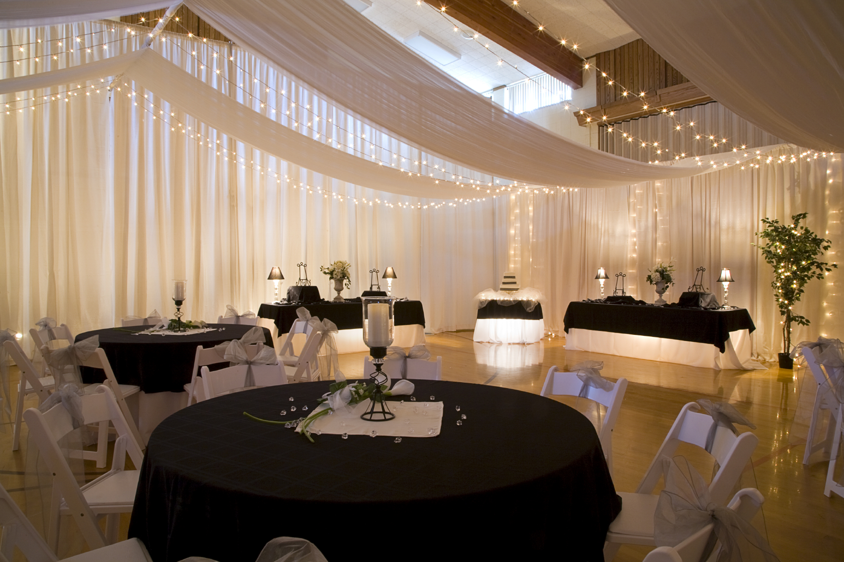 Event venue decorated with holiday and accent lighting