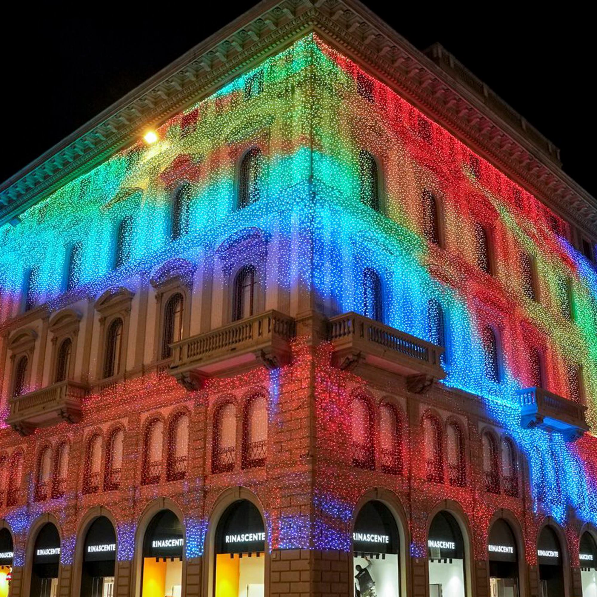 Building facade lit with mapped color effects