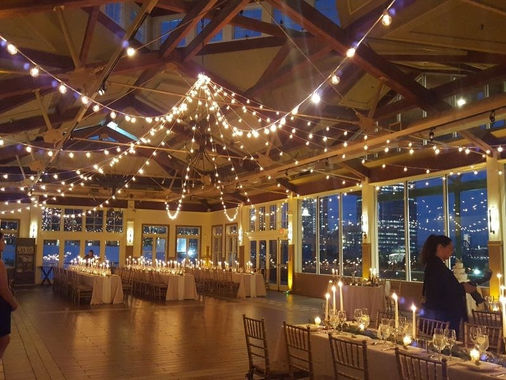 Event pavilion with string lights swagged across the ceiling