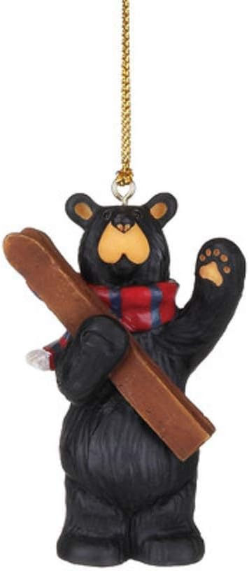 black bear holding skiis ornament front view