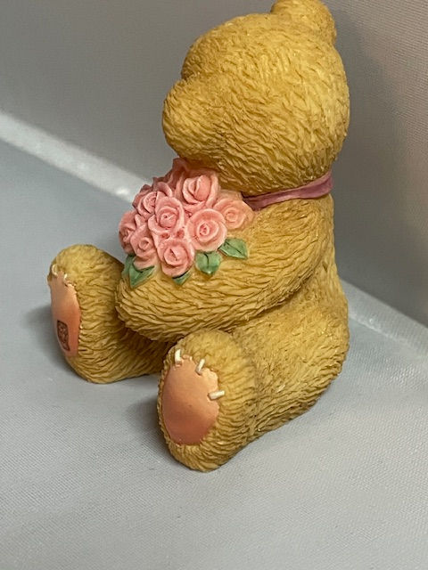 Thumbnail: teddy bear with roses figurine side view
