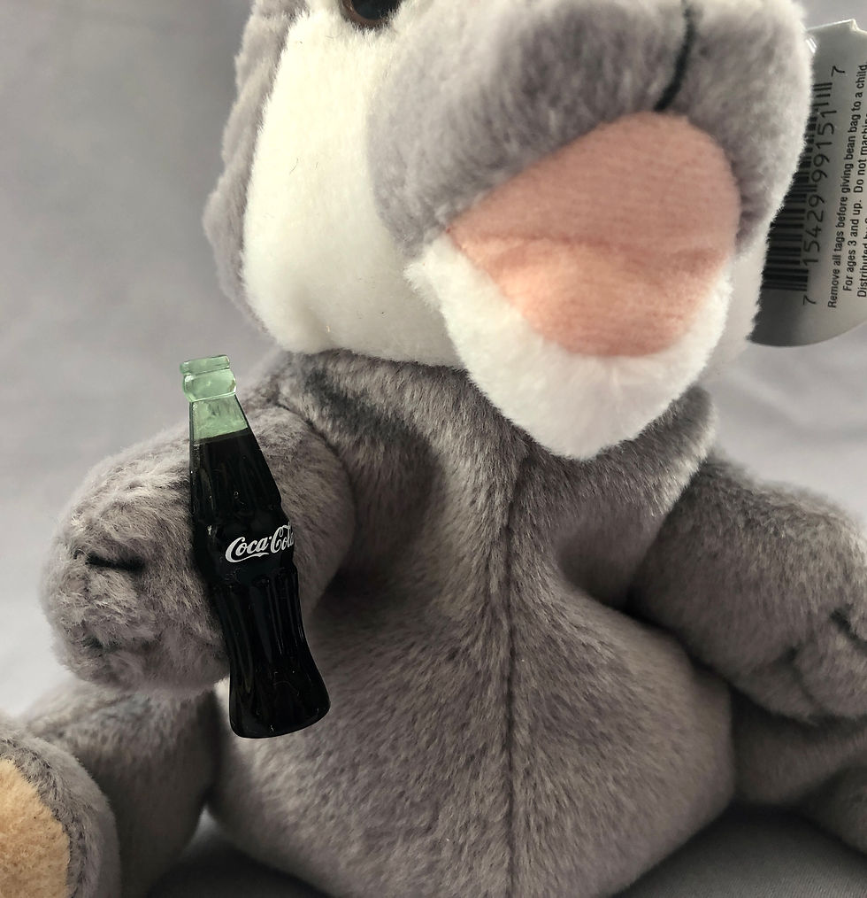 Thumbnail: Howls the Wolf, Coca Cola plush representing Romania close up view