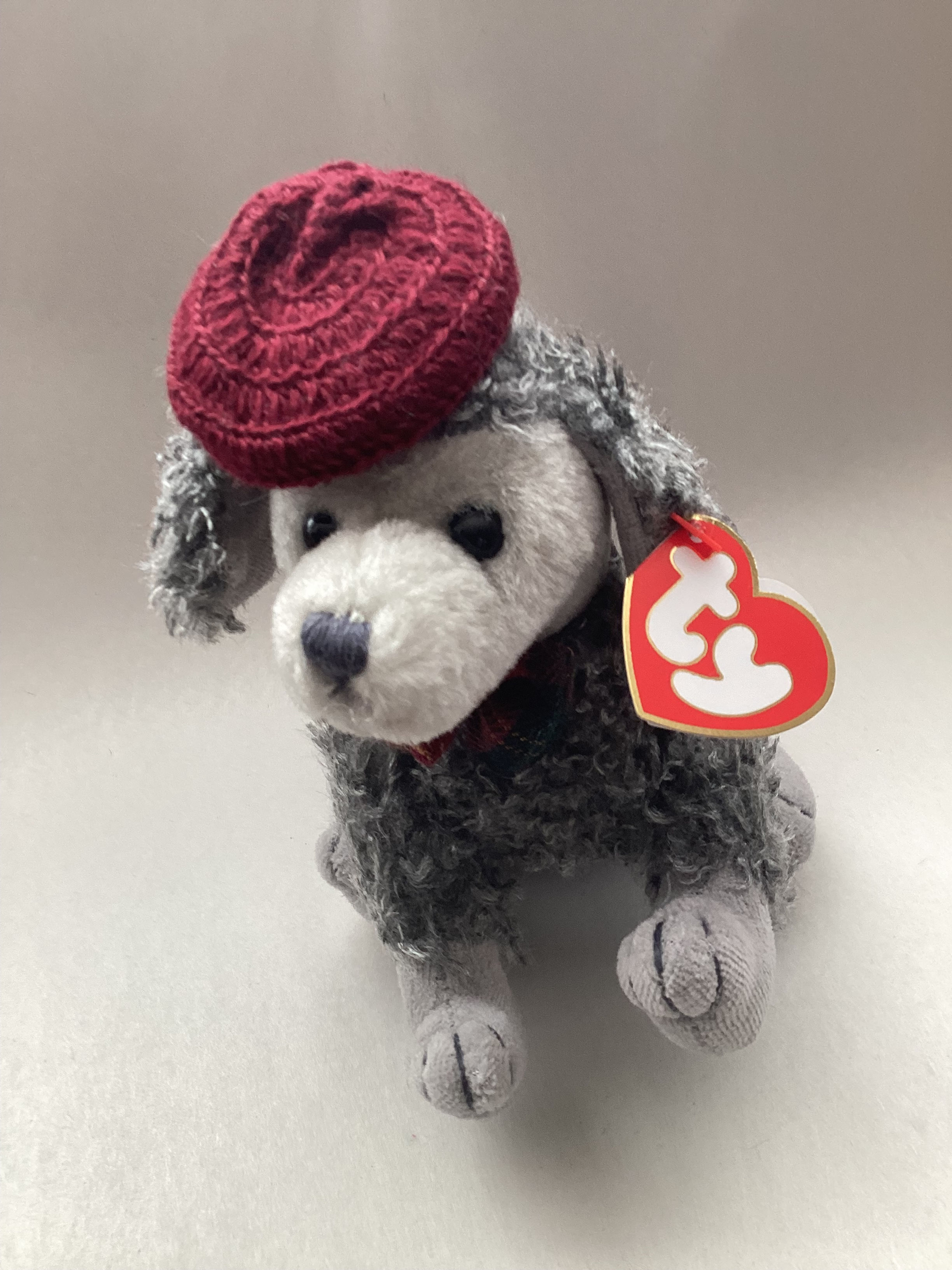 plush poodle in a barret front view