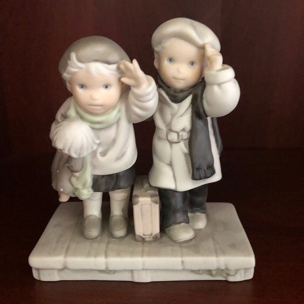 Pretty As A Picture Black and White couple figurine looking forward with their left arm up front view
