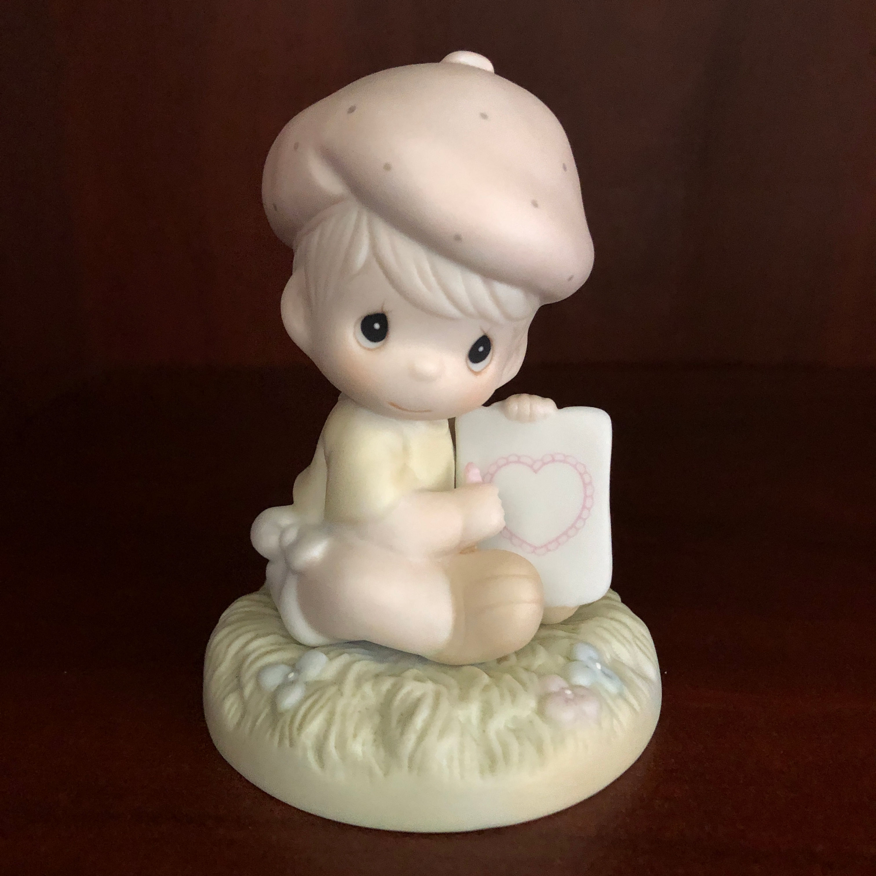Precious Moments Boy with heart drawing figurine front view