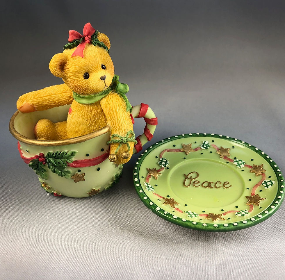 Thumbnail: bear in teacup figurine front view