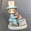 Thumbnail: Precious Moments Boy dressed as Uncle Sam with a telephone figurine front view