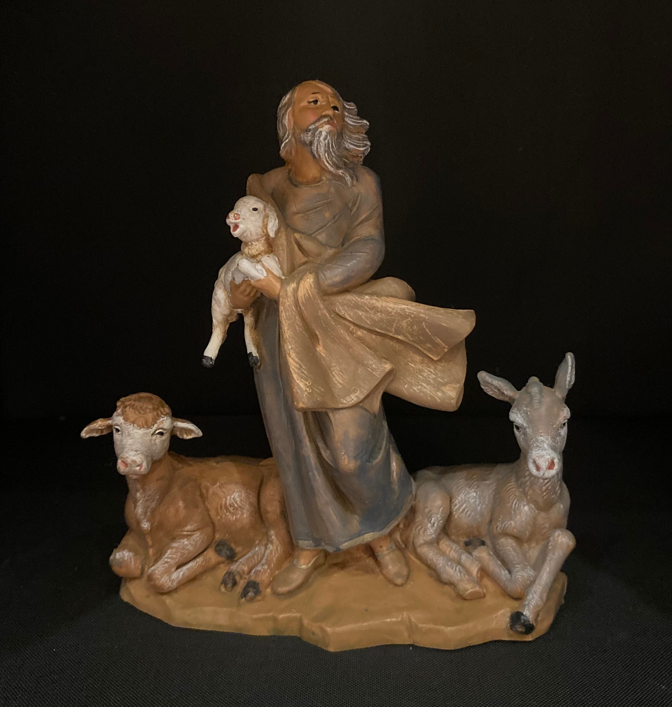 Man with farm animals figurine front view