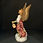 Thumbnail: Angel with gifts and a lantern figurine side view