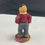 Thumbnail: boyds bear putting on jeans figurine side view