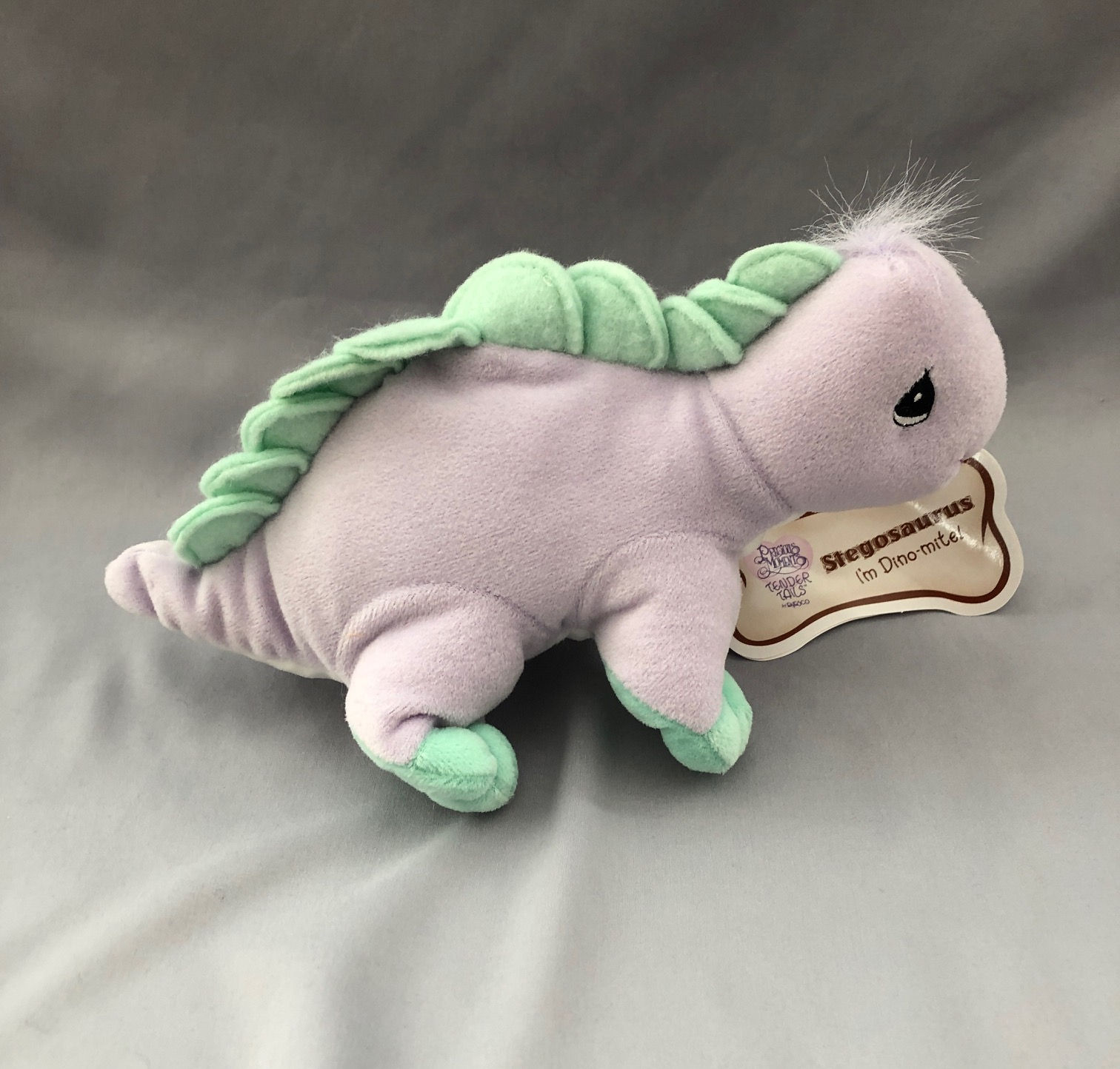 side view of Tender Tails Purple Plush Stegosaurus