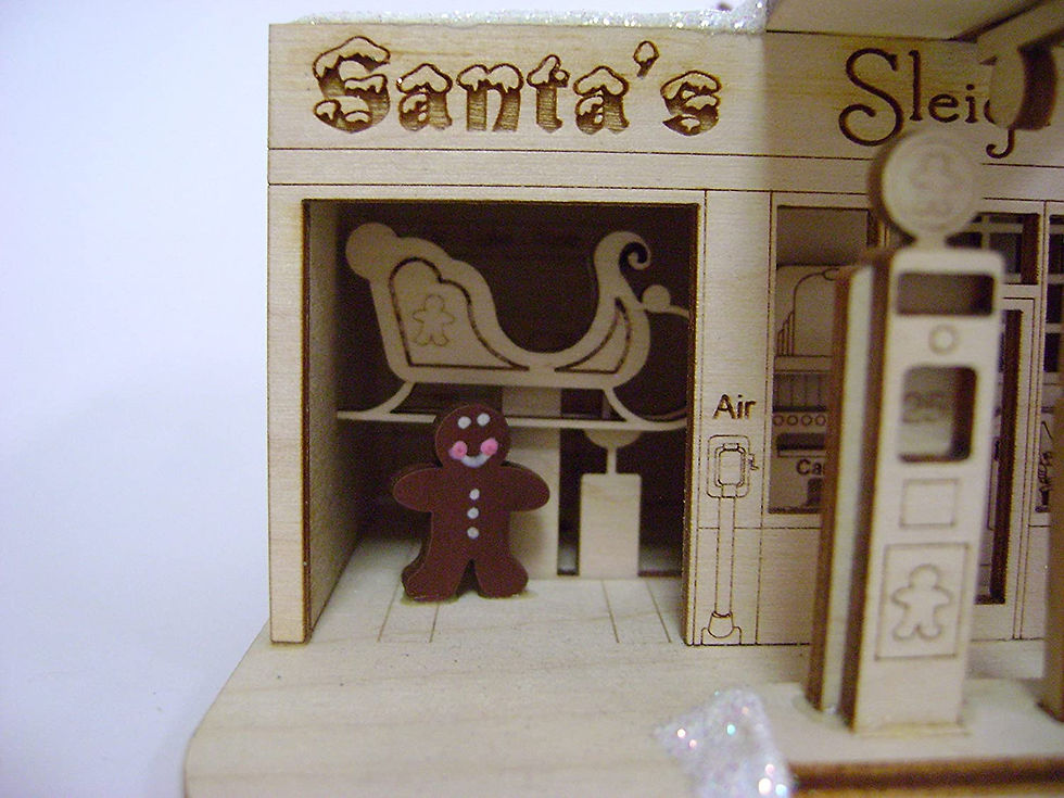 Thumbnail: Santa's Sleigh Station  Ginger Cottages Ornament close up view