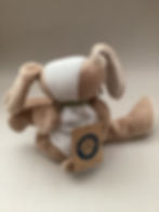 Thumbnail: Tan Dog with Peridot colored ribbon Approximately:  9" x 3" x 2.5"