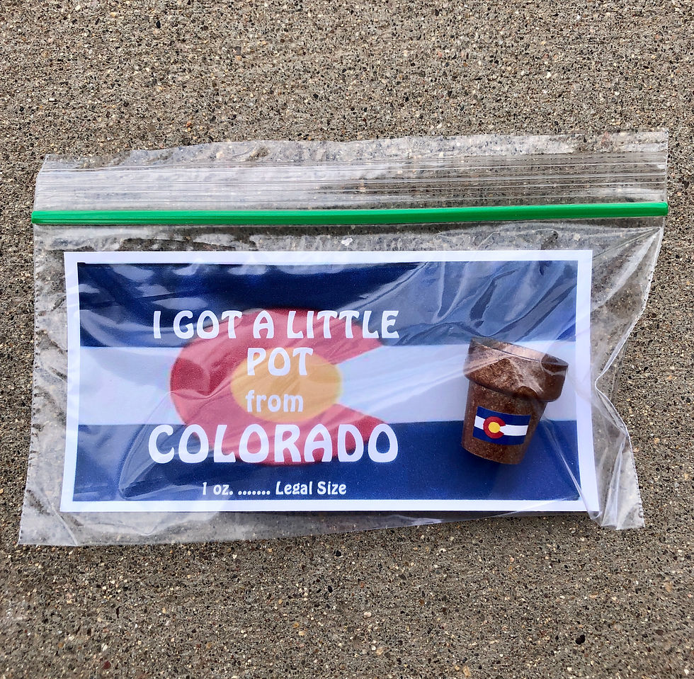 small pot on card with the Colorado State flag that says I got a Little Pot from Colorado