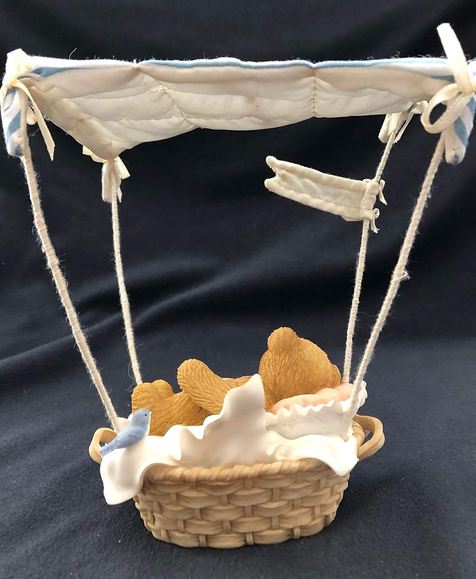 Thumbnail: baby bear figurine