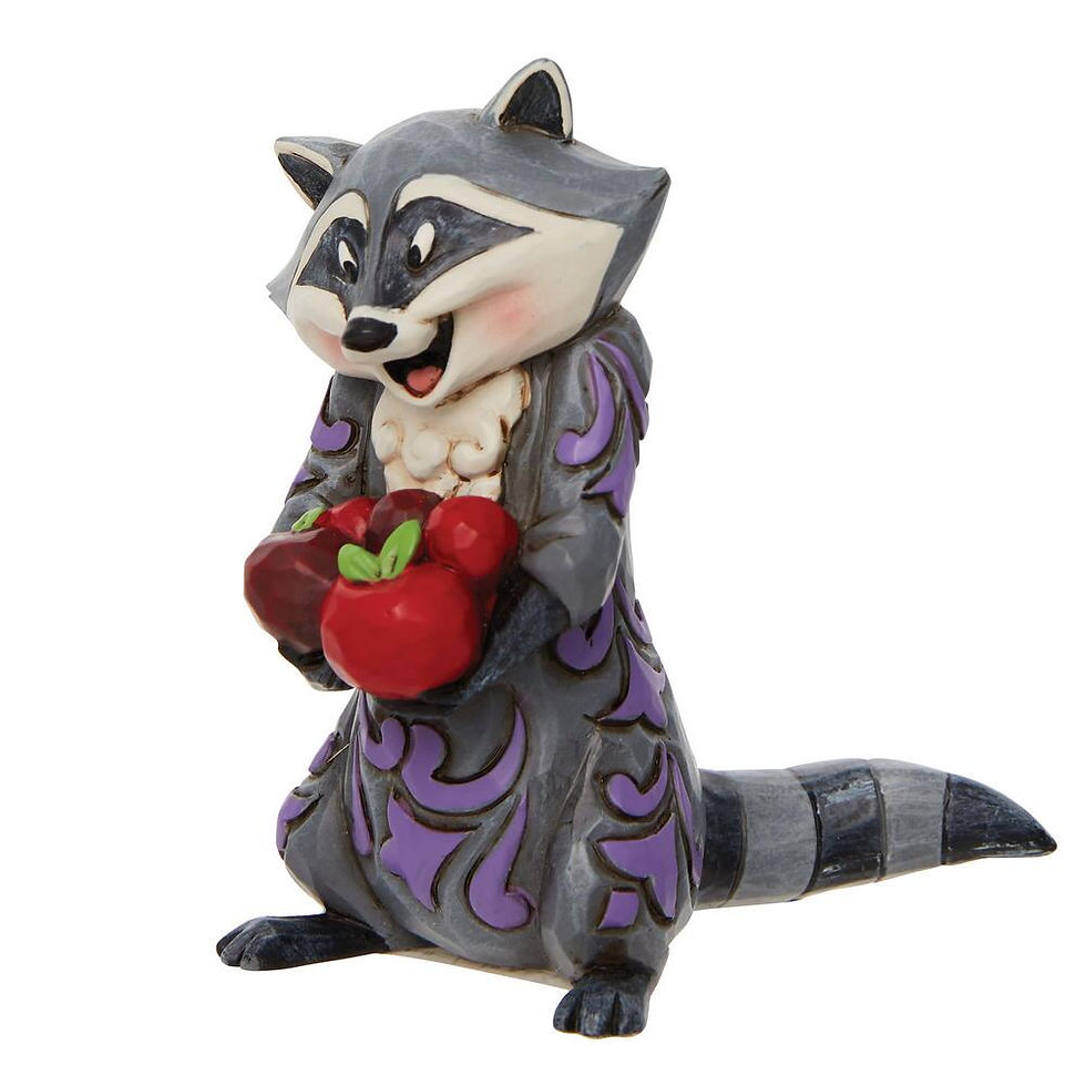 Meeko raccoon with apple figurine angled view