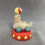 Thumbnail: Seal balancing a ball with a teddy bear figurine rear view