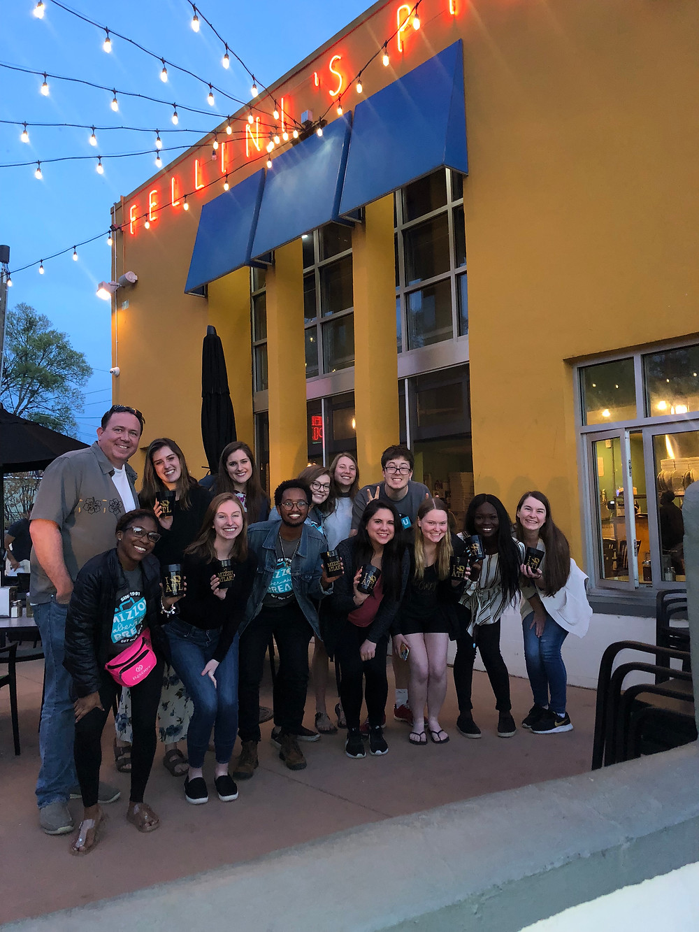 MAB participants at a local pizza place in Atlanta, Georgia with alumnus Chad Bozarth