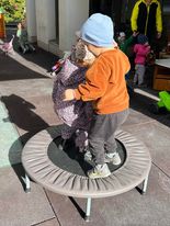 Children enjoy the new-old trampoline.