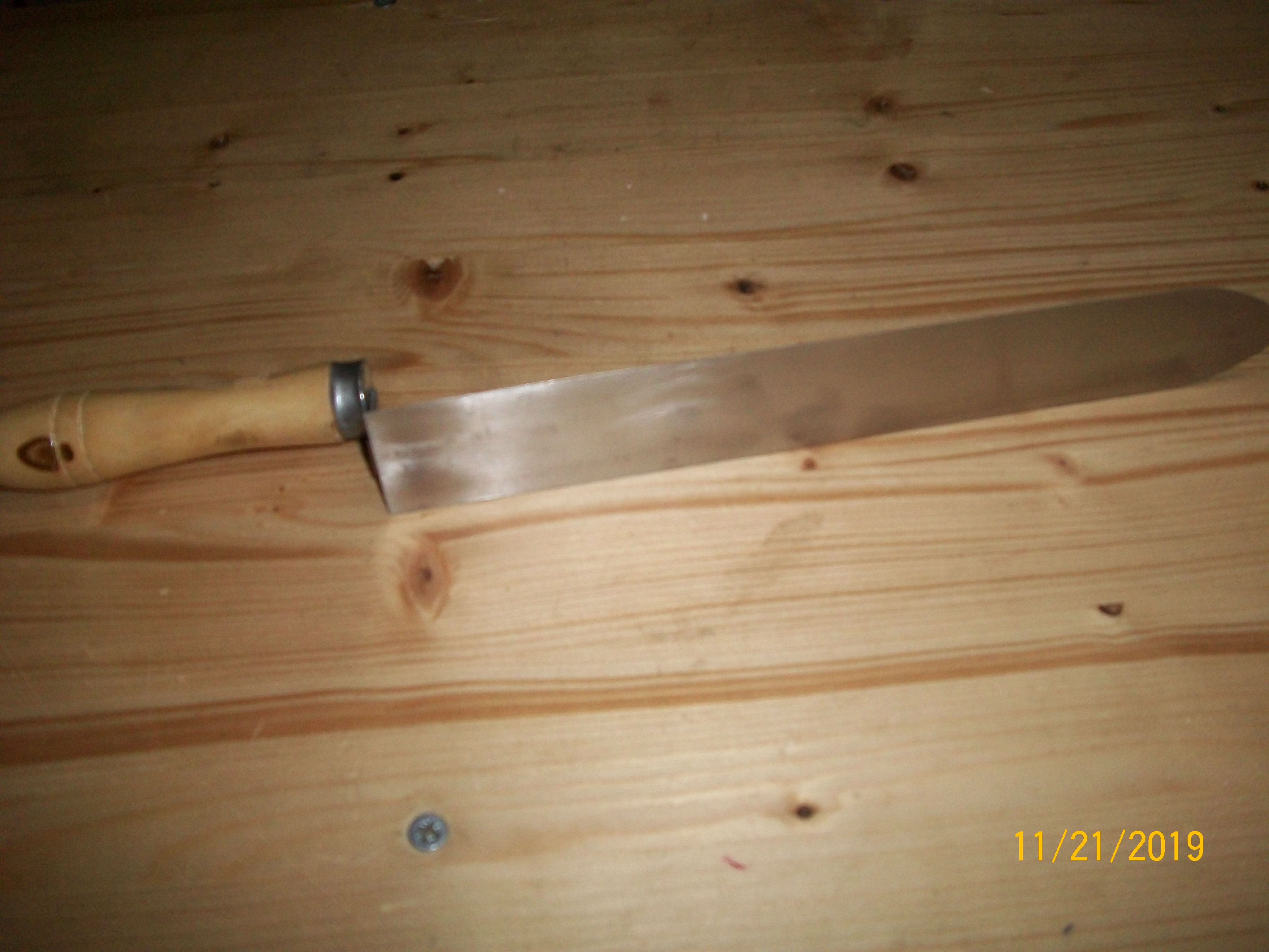 couteau a désoperculer
