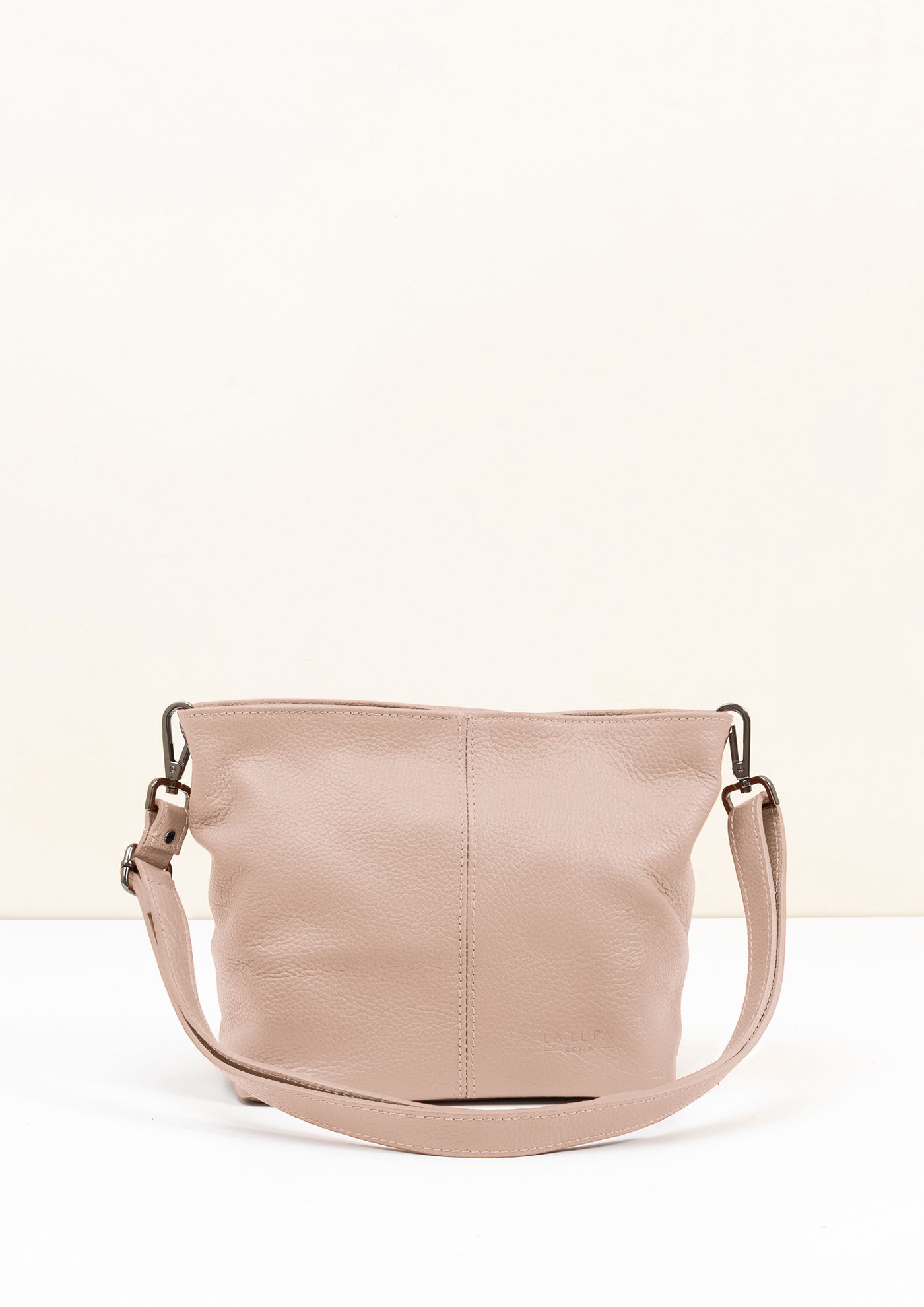 La Lupa Lola Petite Crossbody luxury handbag in blush leather