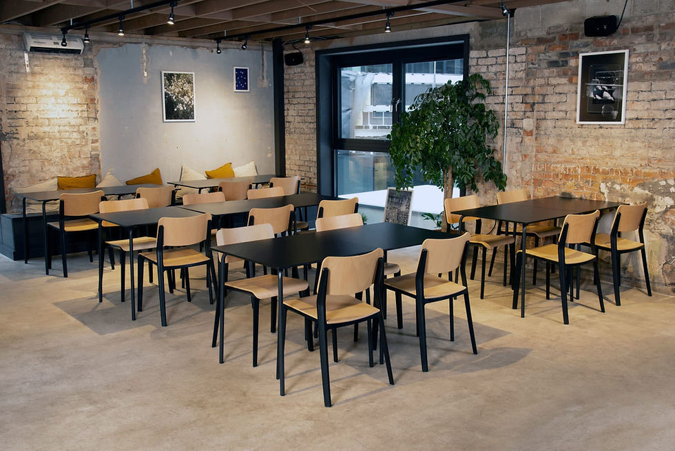 Thumbnail: Origin Mojo Ply dining arm chairs being used in a restaurant