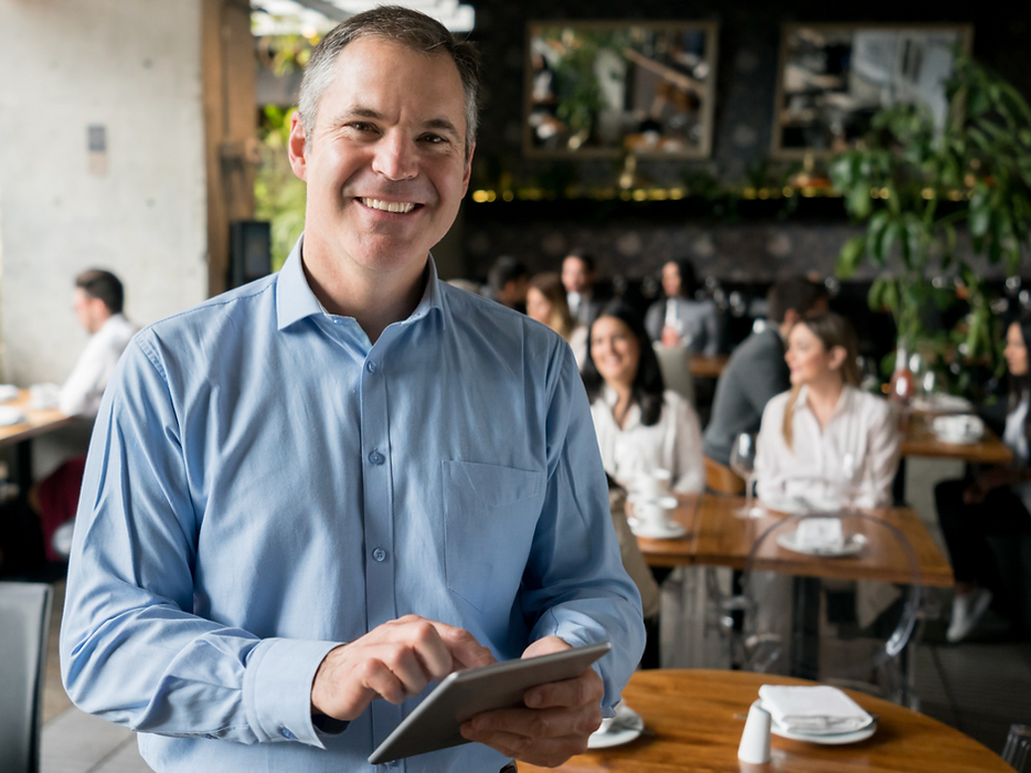 Restaurant manager overseeing operations