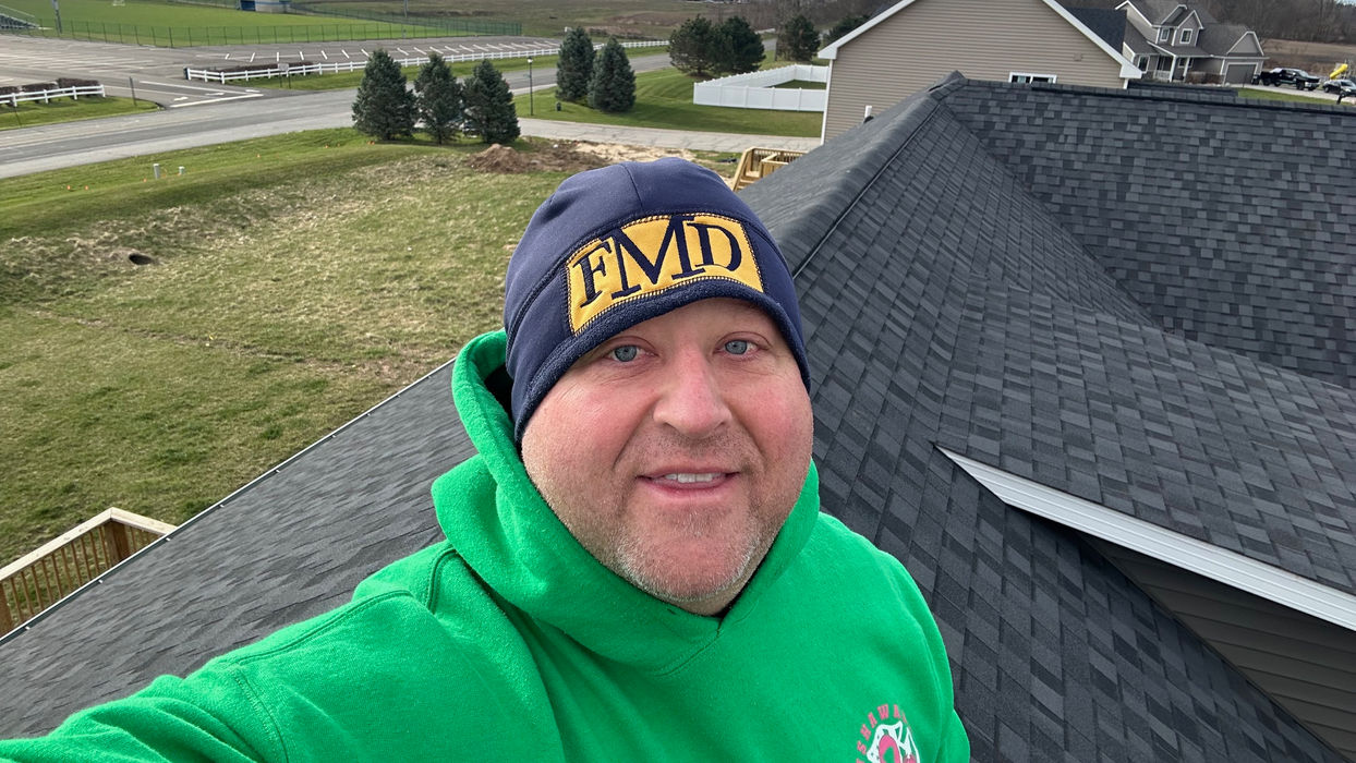 Home Inspector on a roof inspection