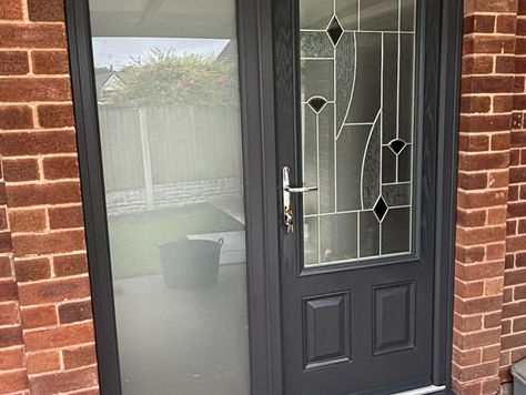 Black composite door with glass side panel