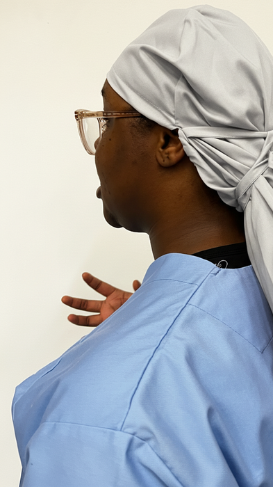 A nurse wearing an Eco Ninjas XL Braided hat with Name & Role Badge, Side View