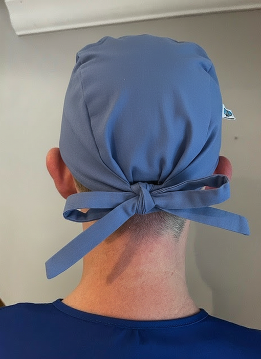 A Surgeon wearing Eco Ninjas name and role badge hats.