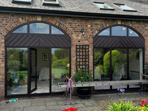 Arched glass panels and glass doors