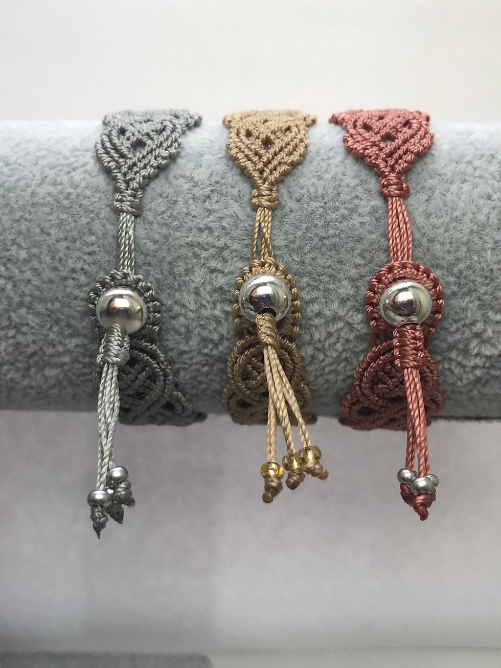 Thumbnail: Handmade macrame Celtic knot style bracelets with stardust beads