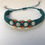Thumbnail: Handmade macrame festive wave style bracelet