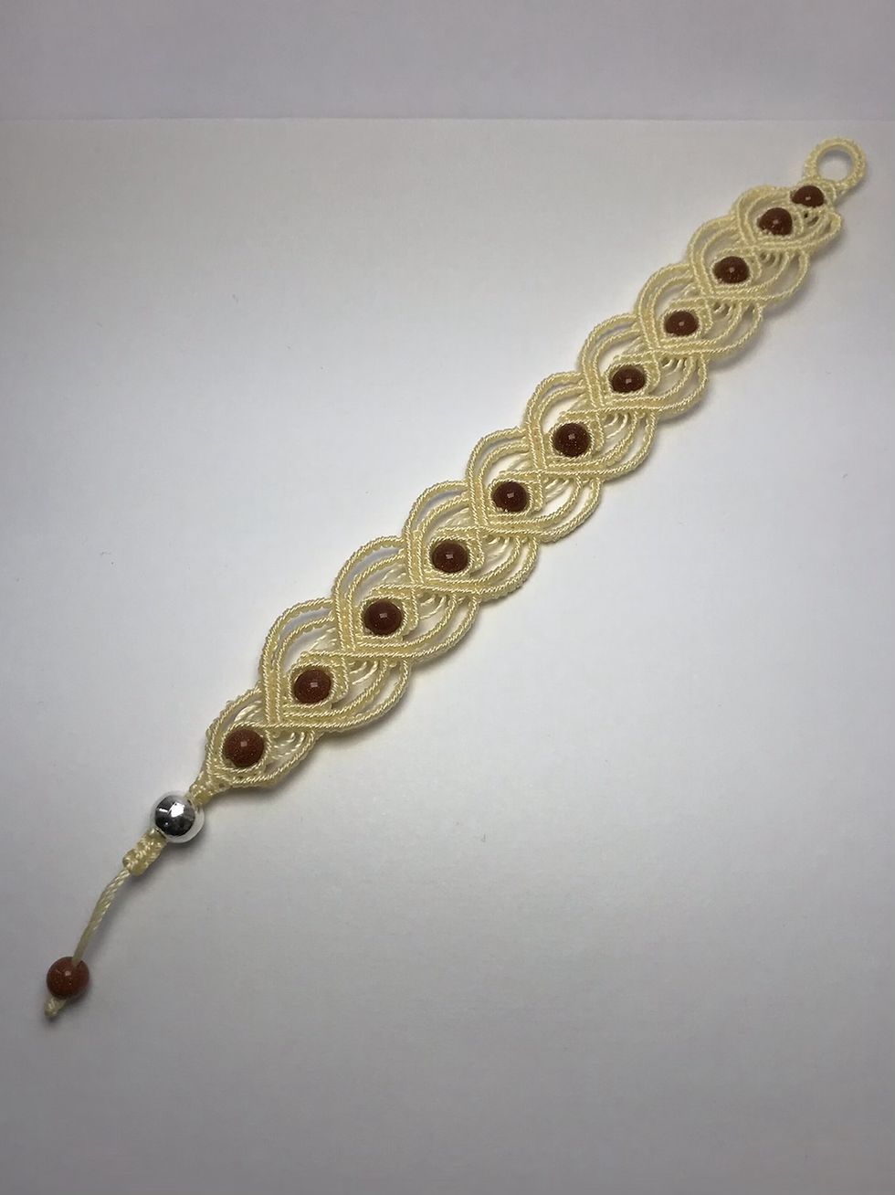 Thumbnail: unique handmade macrame bracelet cream gold sandstone gemstone