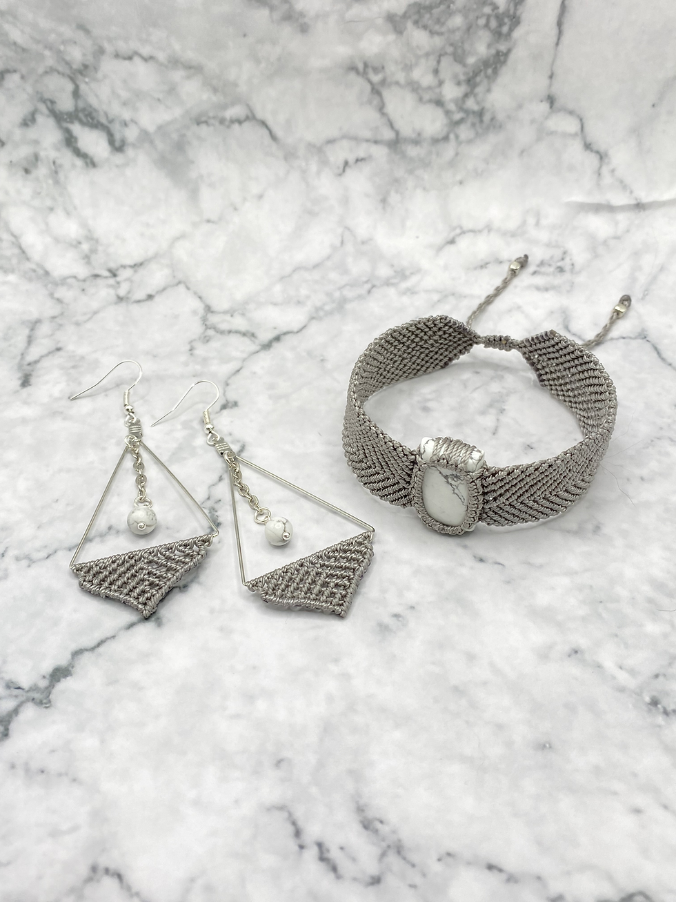Thumbnail: Handmade macrame triangle howelite earrings