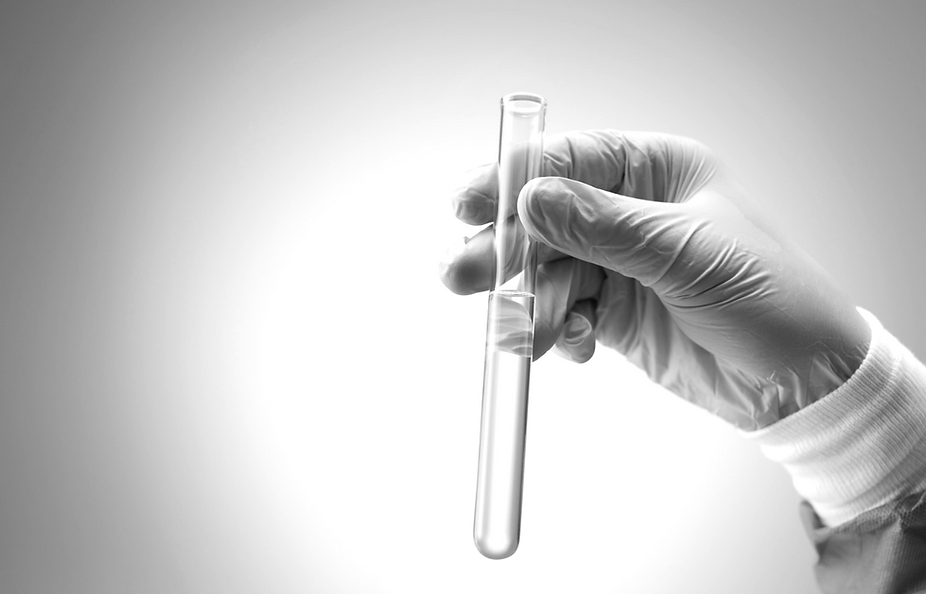 'Proefbuis in de hand' afbeelding op de homepage van nmscResearch