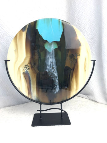 Glass painting with waterful flowing through canyon with trees glass art