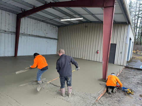 Pouring concrete for a sturdy and smooth surface by Tyeco Services, delivering expert concrete solutions in Vancouver, WA & Portland, OR