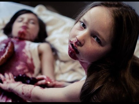 Controversial bloody photos with children by DxE Photography