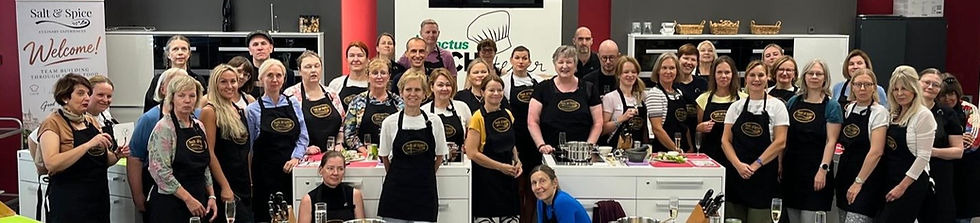 International colleagues enjoying a Salt & Spice culinary team-building experience in Luxembourg.