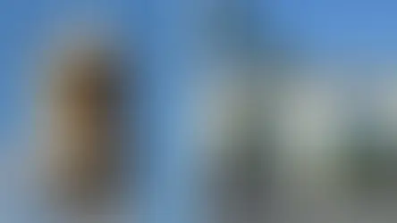 Gegenüberstellung der Warner-Bros.-Studios mit ikonischem Wasserturm und dem Haupteingang von Paramount Pictures – Symbolbild zur Übernahme von Warner Bros. Discovery durch Paramount nach dem Ausstieg von Netflix.