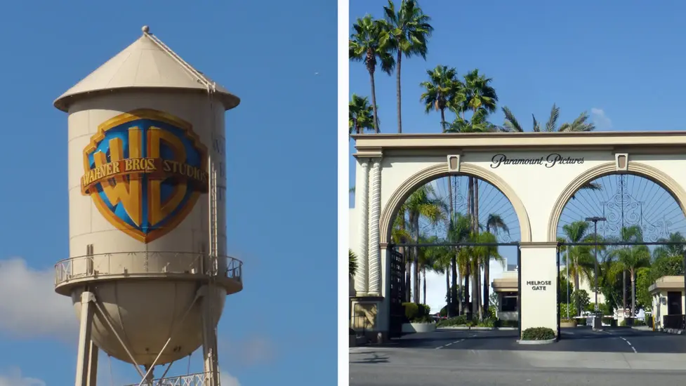 Gegenüberstellung der Warner-Bros.-Studios mit ikonischem Wasserturm und dem Haupteingang von Paramount Pictures – Symbolbild zur Übernahme von Warner Bros. Discovery durch Paramount nach dem Ausstieg von Netflix.